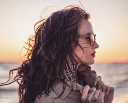 Woman wearing wood sunglasses