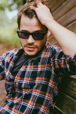 Man wearing PLANK wood polarized sunglasses